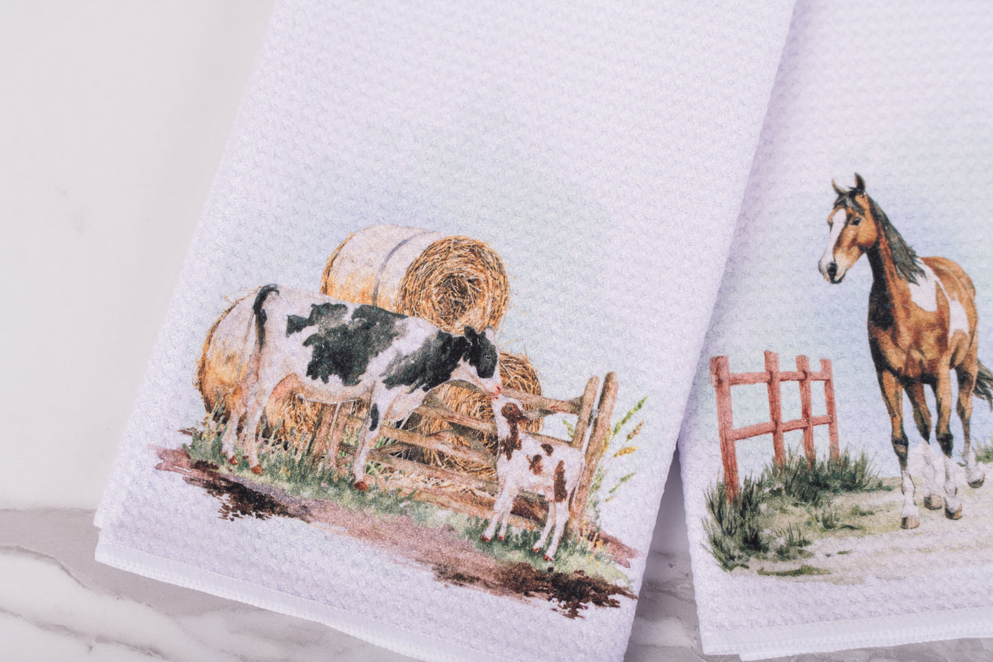 Homestead farm scene tea towel with cow and hay bales