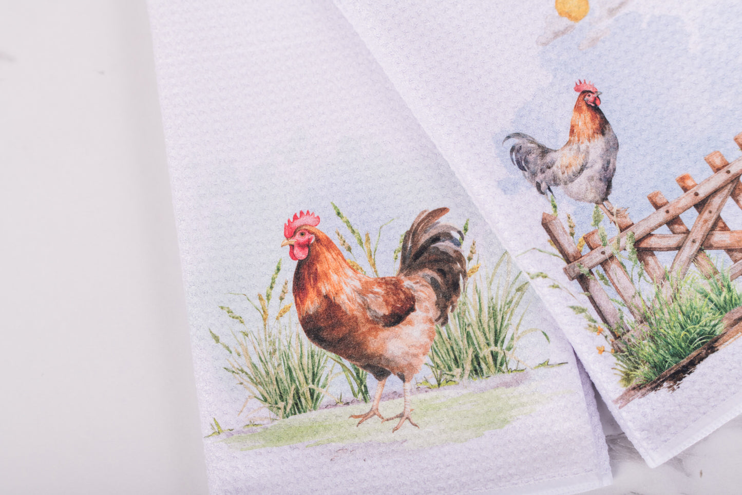 Homestead rooster tea towel with rooster in the grass design