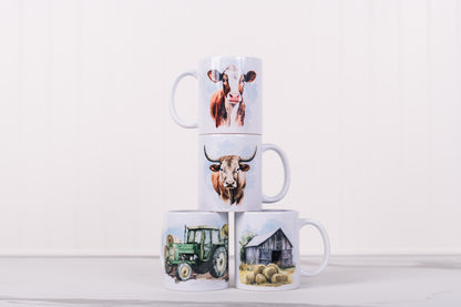 Stack of four mugs with farm-themed designs on a white background