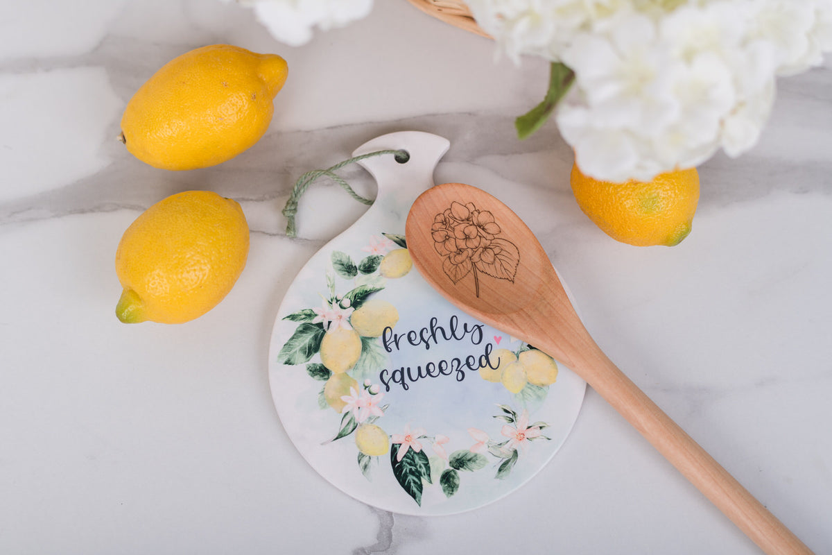 Cottage farmhouse kitchen spoon rest with lemons and words saying freshly squeezed