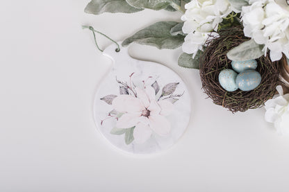 Soft botanical kitchen decor with magnolia flower design