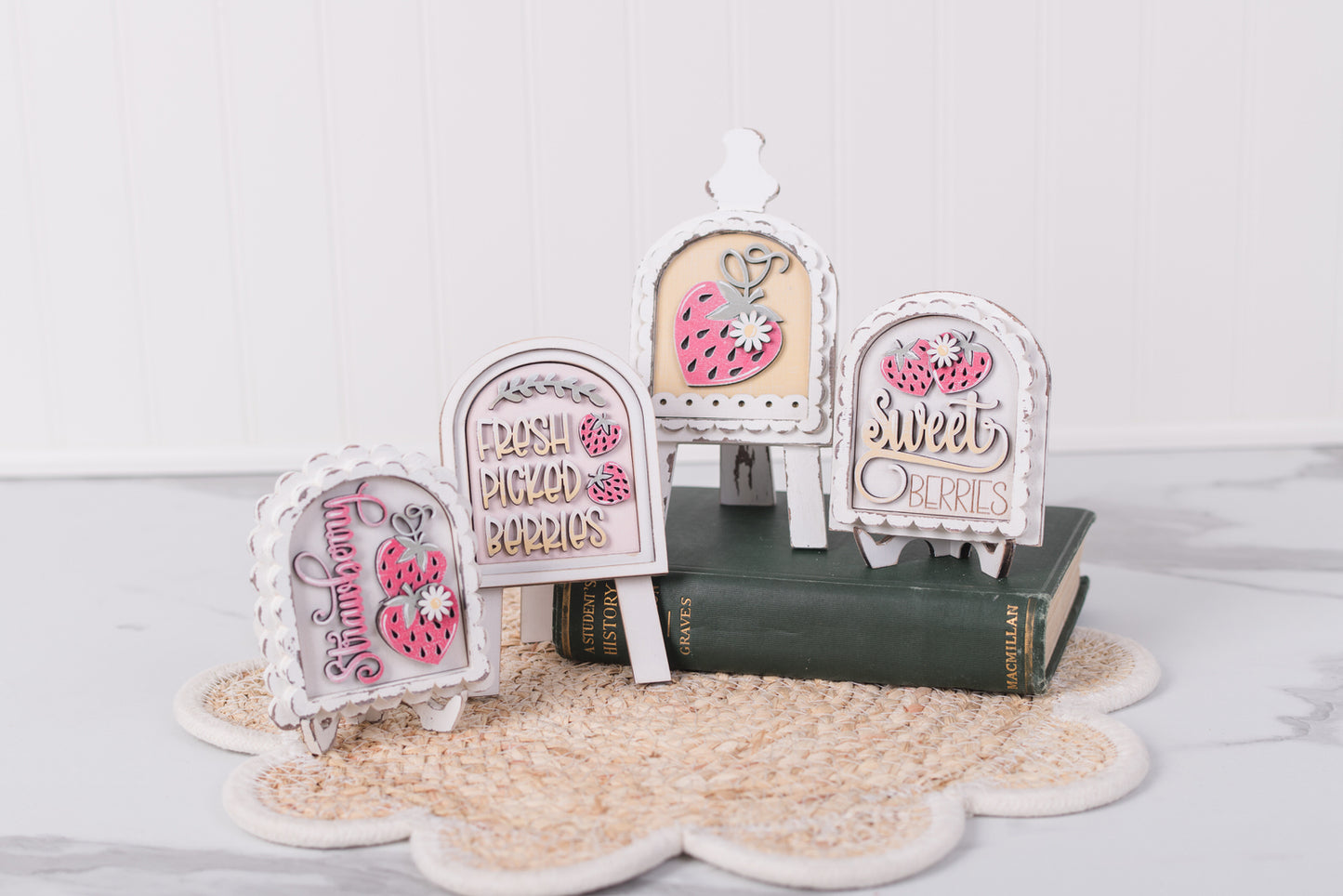 strawberry themed diy mini arch signs styled on small display stands