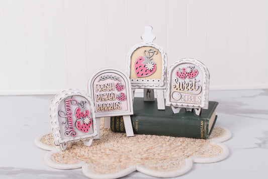 strawberry themed diy mini arch signs styled on small display stands
