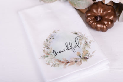 Woodland microfiber hand towel on white counter with bronze pumpkin and leaves