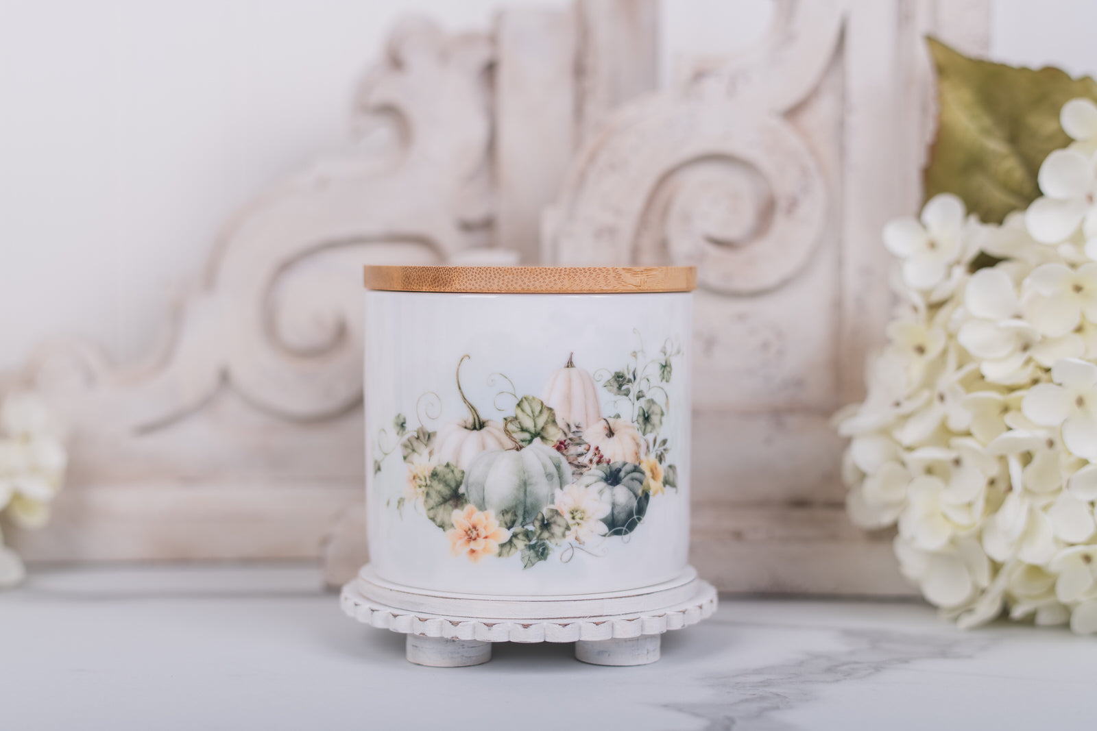 Small ceramic bathroom jar with white pumpkin floral design