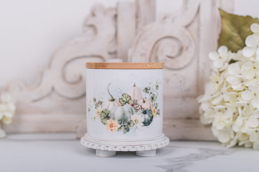 Small ceramic bathroom jar with white pumpkin floral design