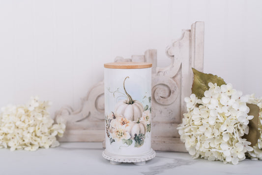 Large ceramic bathroom jar with white pumpkins and bamboo lid