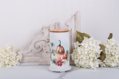 Large ceramic bathroom jar with warm pumpkin artwork and sealed bamboo lid