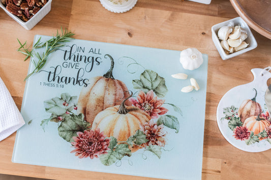 Warm fall cutting board with watercolor pumpkins and “Give Thanks” scripture