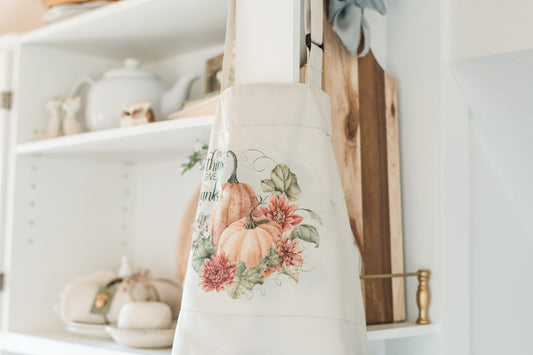 Beige apron with warm fall pumpkin print