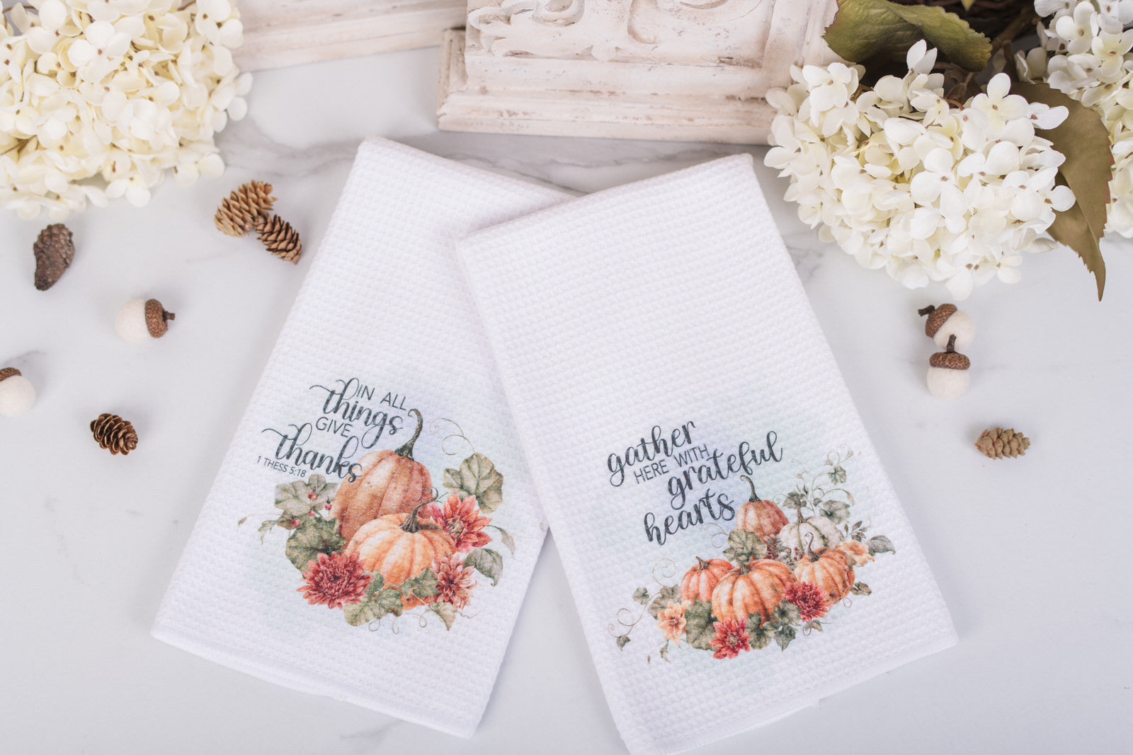 Pumpkin tea towel styled with fall florals and cozy cottage decor