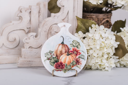 Round ceramic trivet with warm fall pumpkins and florals