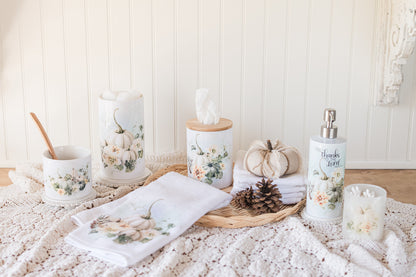 Fall bathroom collection featuring ceramic tissue holder, styled with coordinating canisters, soap, dispenser, and hand towel 