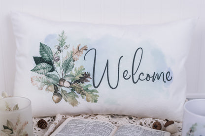 Welcome lumbar pillow cover with watercolor oak leaves and acorns on soft white velveteen – styled for fall entryway or guest room