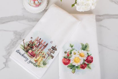 Cottage-style hand towel with watercolour strawberries and summer flowers for the bathroom.
