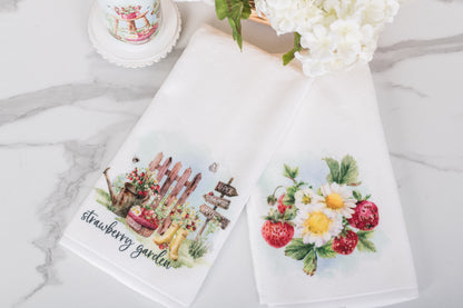 Cottage-style hand towel with watercolour strawberries and summer flowers for the bathroom.
