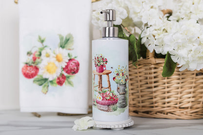 Strawberry soap dispenser at a summer kitchen or bathroom sink.