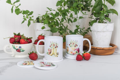 Watercolour strawberry coffee mug on a cozy breakfast table.