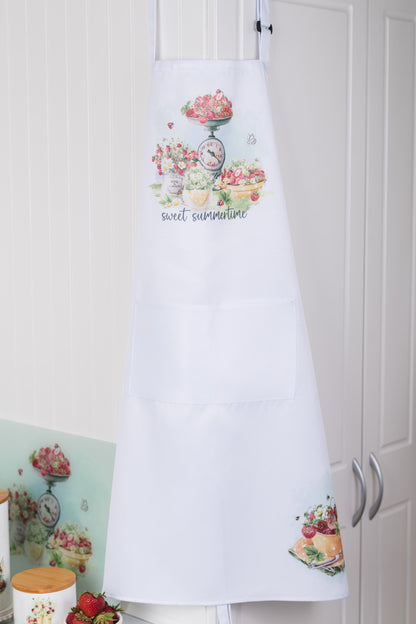 Cottage apron with watercolour strawberries and daisies, perfect for summer baking hanging on cupboard 