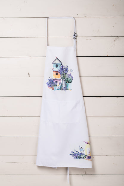 adult apron featuring lavender design  hanging on a white wall
